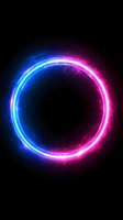 Glowing neon circle frame with electric blue and pink light effects on black background, energy sparks and plasma ring for modern design elements.