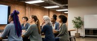 Diverse group of women standing together in modern office space with brick walls, having casual conversation during workplace meeting or networking event.