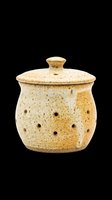 Ceramic garlic keeper with speckled glaze and ventilation holes, isolated on transparent background. Ready for kitchen design, product mockups, home decor clipart, sublimation, and print-on-demand projects.