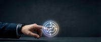 Businessman hand touching glowing digital target symbol with interconnected nodes, representing business strategy, goal achievement, and data network technology solutions.