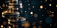 Glowing metallic cylindrical shapes with golden light effects floating in dark space surrounded by luminous bokeh circles, creating futuristic abstract composition.