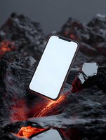 Smartphone with blank white screen placed on volcanic rocks with glowing lava cracks, creating dramatic lighting for tech product photography.