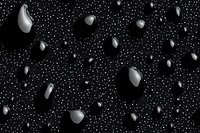 Monochrome asteroid field with scattered rocks and space debris against starry black background, creating dramatic cosmic scenery for astronomy projects.