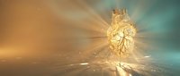 Golden anatomical heart with radiant light beams and ethereal glow on gradient background for medical and spiritual design concepts.