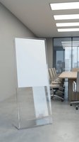 Modern office meeting room with blank white presentation board and conference table for business presentations and corporate training sessions.