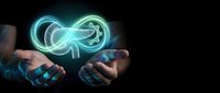 Businessman hands presenting glowing infinity symbol with futuristic holographic effect against dark background for technology and business concepts.