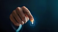 Businessman finger touching glowing digital padlock icon on dark background, representing cybersecurity and data protection in modern technology.