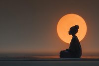 African American woman meditating in lotus position against large orange sun backdrop during golden hour sunset for wellness and mindfulness concepts.