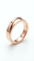 Rose gold band ring with grooved detail, isolated on white background, suitable for jewelry design, wedding collections, and e-commerce product displays.