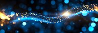 Magical glowing wave with sparkling blue and gold bokeh lights on dark background creates ethereal atmosphere for festive designs and celebrations.