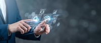 Businessman using smartphone with digital technology icons and connectivity symbols floating above device for modern communication and business solutions.