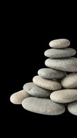 Stacked smooth gray stones isolated on transparent background, ready for wellness, spa, meditation, and zen design projects including t-shirts, posters, and print-on-demand products.
