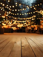 Wooden deck with blurred festive string lights creating magical bokeh effect in background, warm evening atmosphere for celebrations and outdoor events.
