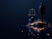 Silhouette of businessman standing near golden scales of justice with magical light trail effect on dark blue background. Legal concept illustration.