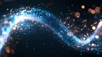 Magical glowing blue light trail with sparkling particles and bokeh effects on dark background, creating dynamic motion and energy flow pattern.