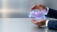 Male professional in business attire holding glowing purple digital energy between hands, representing innovation, technology, and creative power for corporate concepts.