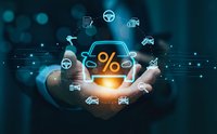 Businessman hands holding glowing percentage symbol with automotive icons representing car loan interest rates and financing options for dealership marketing.