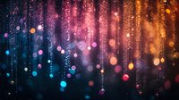 Magical glowing particles and light streaks falling against dark background creating dreamy atmosphere with pink, blue and orange bokeh effect.