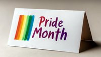 Rainbow colored pride month text on white folded card with watercolor rainbow stripe design, celebrating LGBTQ+ community and diversity awareness.