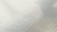 Minimalist abstract geometric pattern with intersecting thin lines creating subtle grid texture on light neutral background for modern design projects.