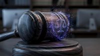 Wooden gavel with glowing digital law shield and scales hologram, representing legal technology, justice system innovation, and cyber law enforcement for courtroom applications.