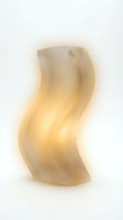 Abstract golden curved shape with soft translucent glow on white background for modern design projects and creative presentations.