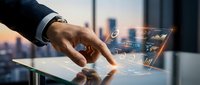 Businessman hand touching holographic digital interface with financial charts and data analytics on modern glass table with city skyline background.