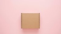 Cardboard shipping box on pink background, top view. Kraft paper package ready for delivery, e-commerce, and logistics design projects.