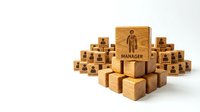 Wooden blocks arranged in a pyramid with a central manager cube leading a team, symbolizing corporate hierarchy and leadership structure on white background.