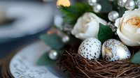 Delicate Easter arrangement with cream roses and decorated eggs in natural twig nest, adorned with silver ornaments and fresh greenery. Perfect for spring decor.
