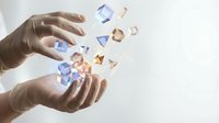 Hands cupping floating holographic geometric shapes with glowing effects on white background for technology and innovation concepts.