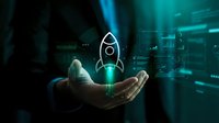 Hand holding glowing rocket hologram with digital interface elements representing startup launch, innovation and business growth in futuristic technology environment.