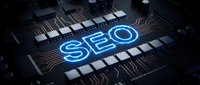 Futuristic computer processor chip with glowing blue SEO text on dark circuit board background for digital marketing and search engine optimization concepts.