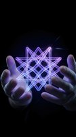 Glowing purple geometric star pattern floating above cupped hands against dark background with light rays for spiritual and technology concepts.