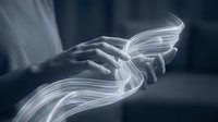 Hands releasing flowing white smoke or energy streams in artistic motion against dark background for creative design projects and spiritual concepts.