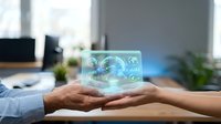 Businessman and businesswoman hands holding holographic earth globe with digital interface icons representing global technology and environmental sustainability.