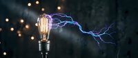 Vintage Edison bulb with electric lightning bolts emerging from filament against dark smoky background with warm bokeh lights for energy concepts.