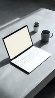 Modern white laptop with blank screen on concrete desk with coffee mug and succulent plant in natural sunlight shadows for remote work and productivity concepts.