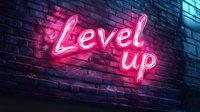 Pink neon sign reading Level up glowing on dark brick wall background with vibrant lighting effects creating modern urban nightlife atmosphere.