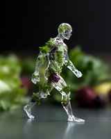 Crystal clear human figure in motion with organic elements, leaves and flowers embedded within transparent form against dark background, artistic conceptual composition.