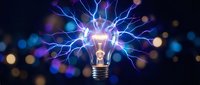 Glowing light bulb with electric lightning bolts and energy sparks on dark background with bokeh lights for innovation and creativity concepts.