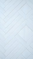 White wooden parquet flooring in herringbone pattern with natural wood grain texture for interior design and home renovation projects.