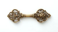 Ornate brass decorative hardware with intricate scrollwork details and central connector, suitable for furniture embellishment, cabinet doors, and vintage restoration projects.