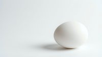Single white egg isolated on light background, suitable for food, nutrition, cooking, and culinary design projects.