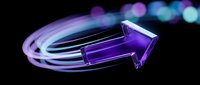Purple gemstone crystal with glowing light trails and bokeh effects on black background for luxury jewelry design and digital art projects.