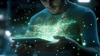 Young Caucasian man holding digital tablet with glowing green particles emerging from screen, creating magical ethereal effect in dark environment with bokeh lights.