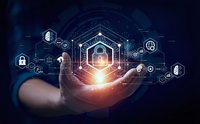 Businessman hand holding glowing cybersecurity shield with network icons and data protection symbols in digital technology concept.