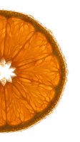 Sliced orange citrus fruit segment showing translucent flesh and detailed internal structure against white background, isolated for design and culinary use.