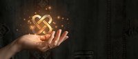 Glowing golden dollar sign symbol floating above open palm with magical sparkles and light effects on dark background for financial concepts.