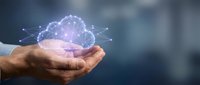 Human hands holding glowing digital brain with neural network connections representing artificial intelligence and machine learning technology concepts.